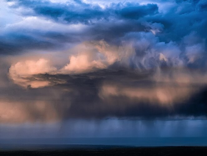 Clouds melt in the sea